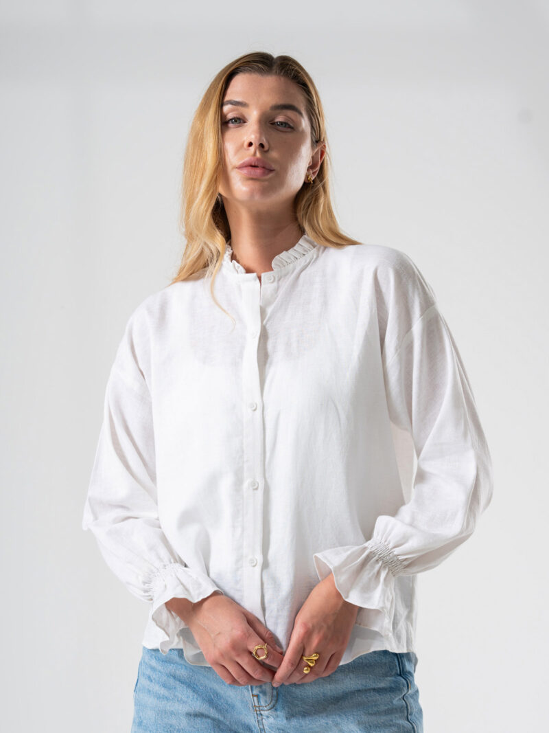 White ruffled linen shirt